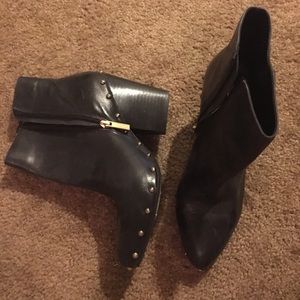 BCBG gold studded black leather booties